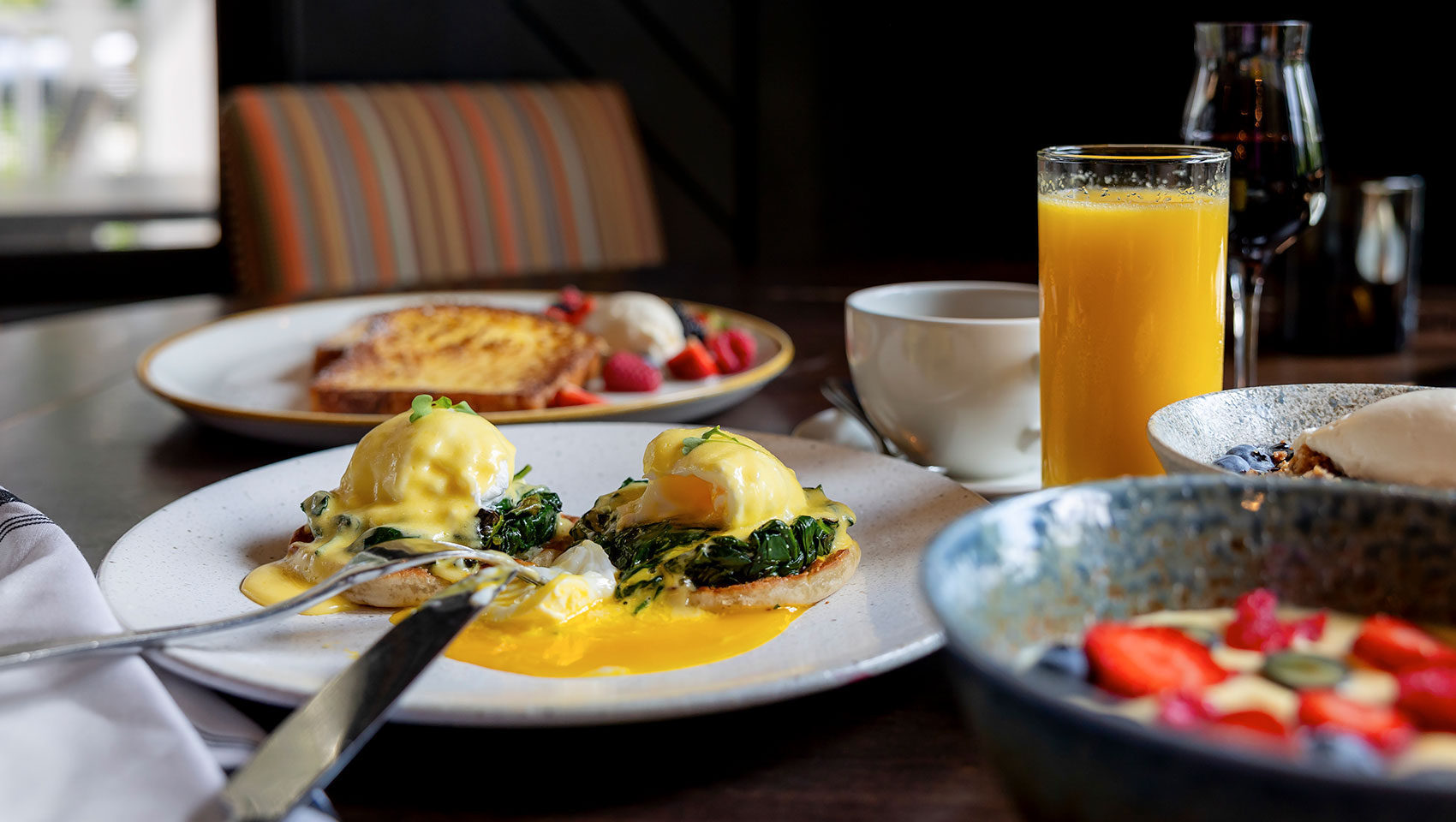 brunch spread on copper grouse dining table