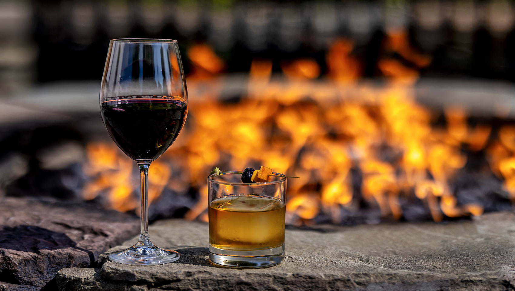 cocktails by the outdoor fireplace