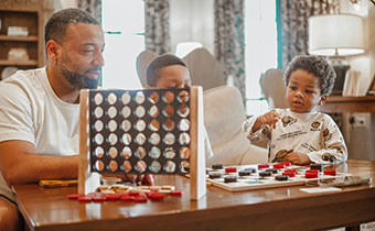 family playing a board game